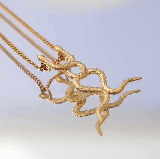 Intertwined snakes necklace